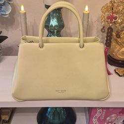 New Kate Spade Leather Satchel in a very light Yellow.
