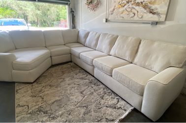 Beautiful, large sectional sofa by Kevin Charles. It is in great condition