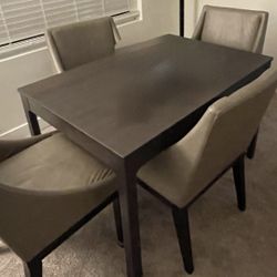 Expandable Dining Table and 7 Leather Chairs 