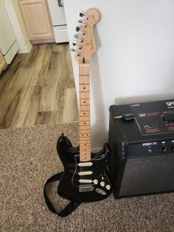 Fender STRAT MIM ,SPIDER V240 GUITAR AMP A D GIO GUITAR TRANSMITER.and FENDER GUITAR CASE.
