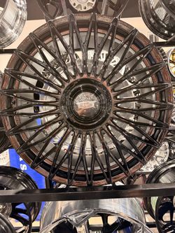 22s staggered Cadillac wheels 22x9 22x10.5