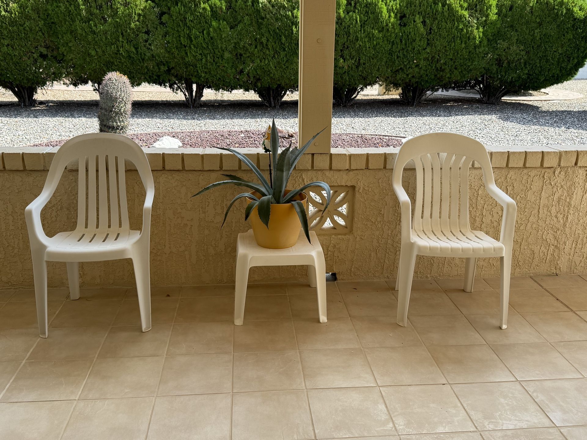 2 Plastic Chairs And Table