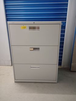 Metal file cabinet $ 150