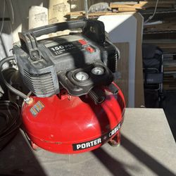 Porter Cable 150 PSI Pancake Compressor And 2 Porter Cable 18gage Brad Nailers And 1 Hitachi Brad Nailer.