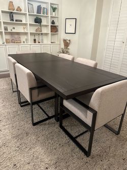 Selling our beautiful Living Spaces Lars II Extendable Dining Set. Originally purchased for $2,485. The set is in excellent condition and has been wel