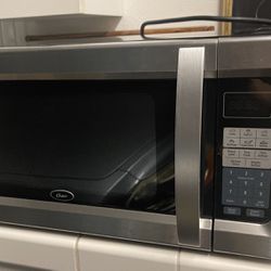 Oster 1100 watts microwave 