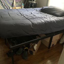 Full Size Bed. Lifted For Storage Underneath