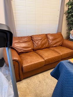 Leather couch and loveseat