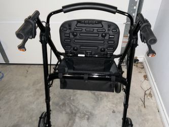 Black walker with storage seat