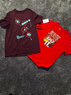 2 brand new Nike shirt’s
