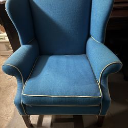 Blue Wingback Armchair With Yellow Piping