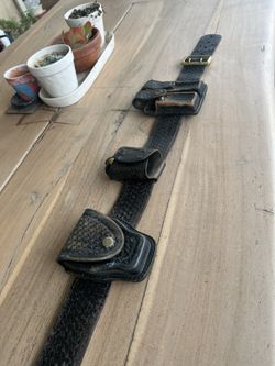 Perfect For Halloween Police costume. Adjustable leather belt.