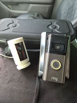 Ring Wireless Doorbell cam with battery and solar panel an Ring Indoor Cam