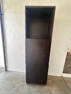 Dark brown tall cabinet shelf