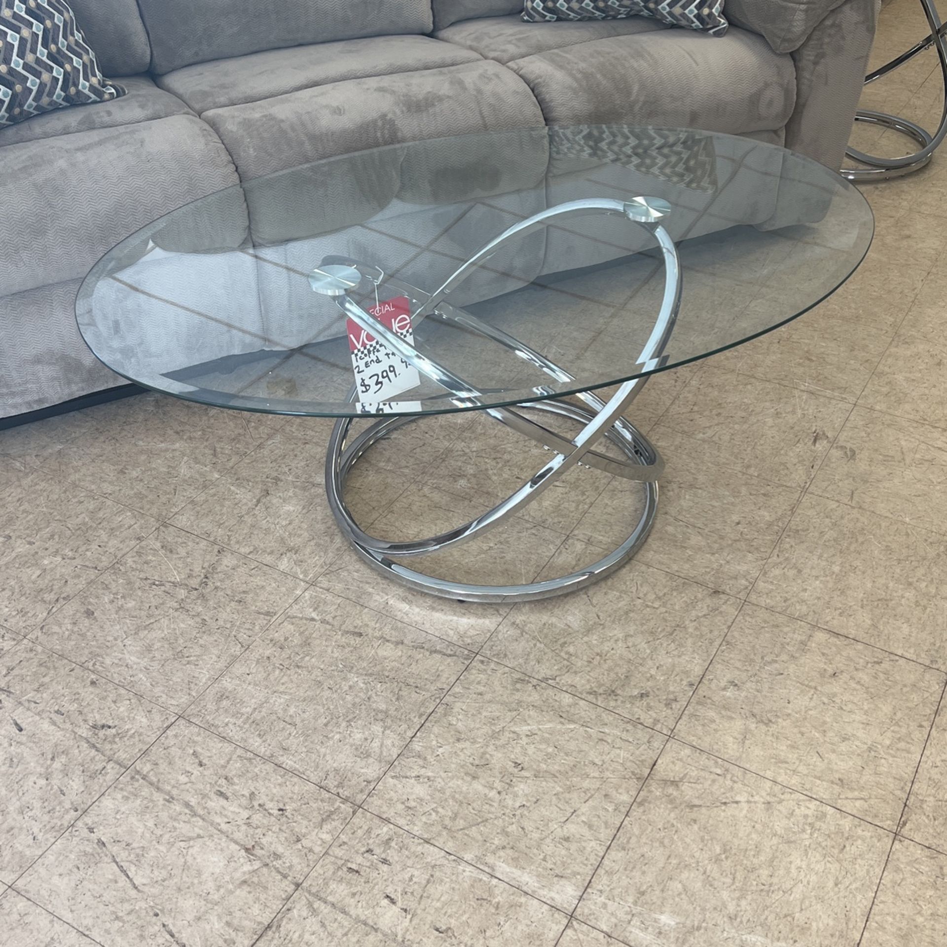 Brand new cocktail table and two end tables, 399, reclining sofa, 699