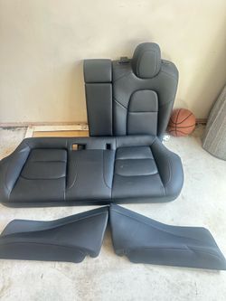 OEM Tesla Black leather Rear Seats and Sides