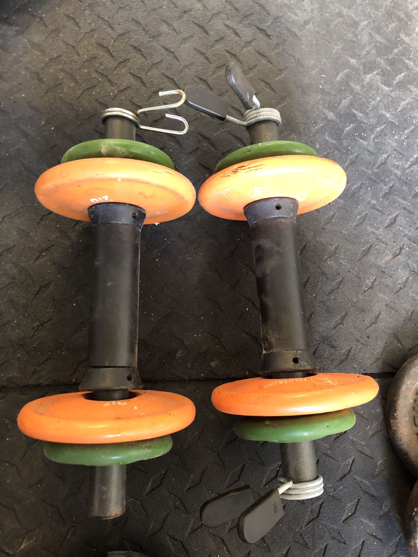 Pair of adjustable 1” standard dumbbells and 12lbs of weights