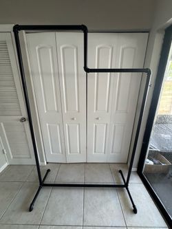 Black metal clothing rack