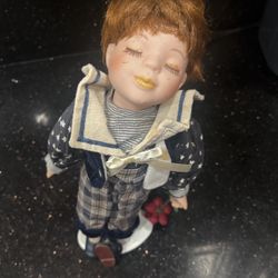 Kissing face, porcelain doll little boy