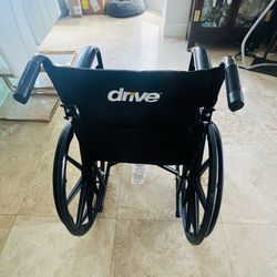 Drive Wheelchair with Stirrups.