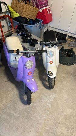 2 Razor Pocket Mod miniature scooters- very used. One currently not working