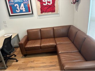 7ft by 7ft  L shaped Brown Leather Couch