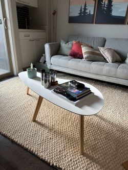 White Oval Coffee Table with Wood Legs
