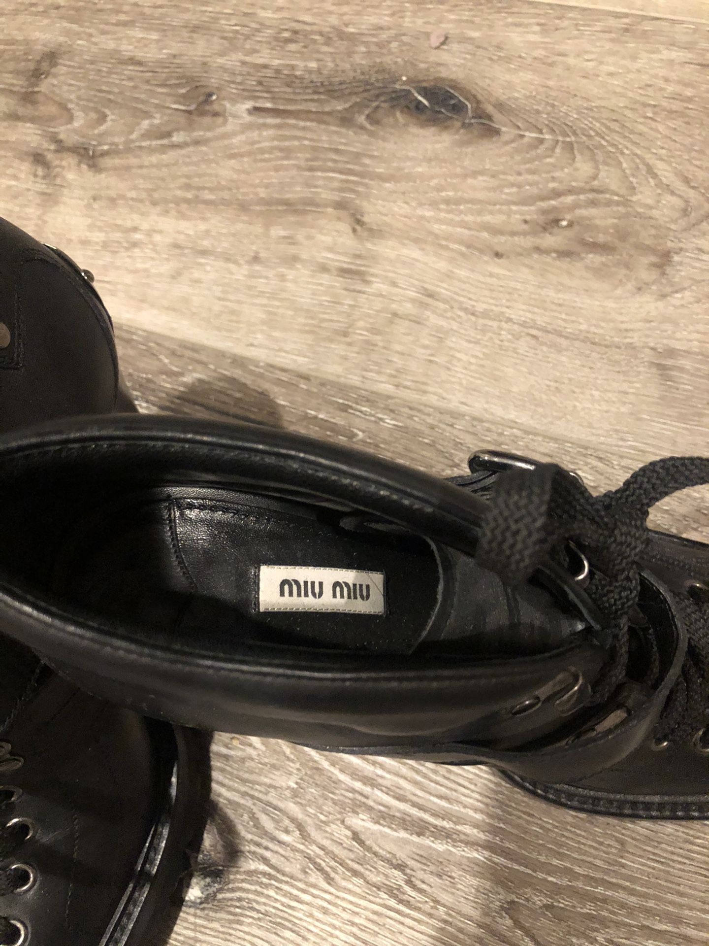 Authentic Miu Miu size 9 black leather booties