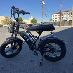 V9G60 Electric Bike — $700, brand new in box.