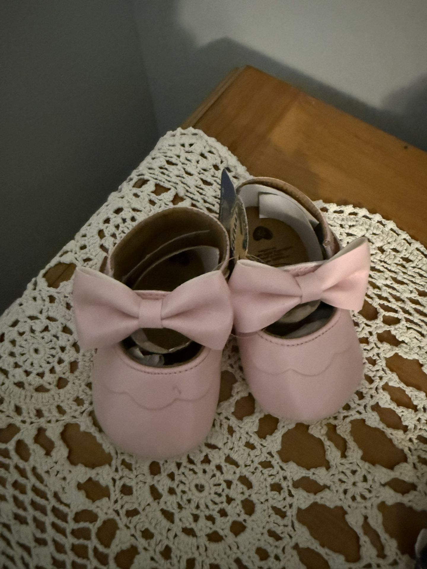 Brand new girl shoes. Size 6-12 months. Comes from a smoke free home. Bundle and save.