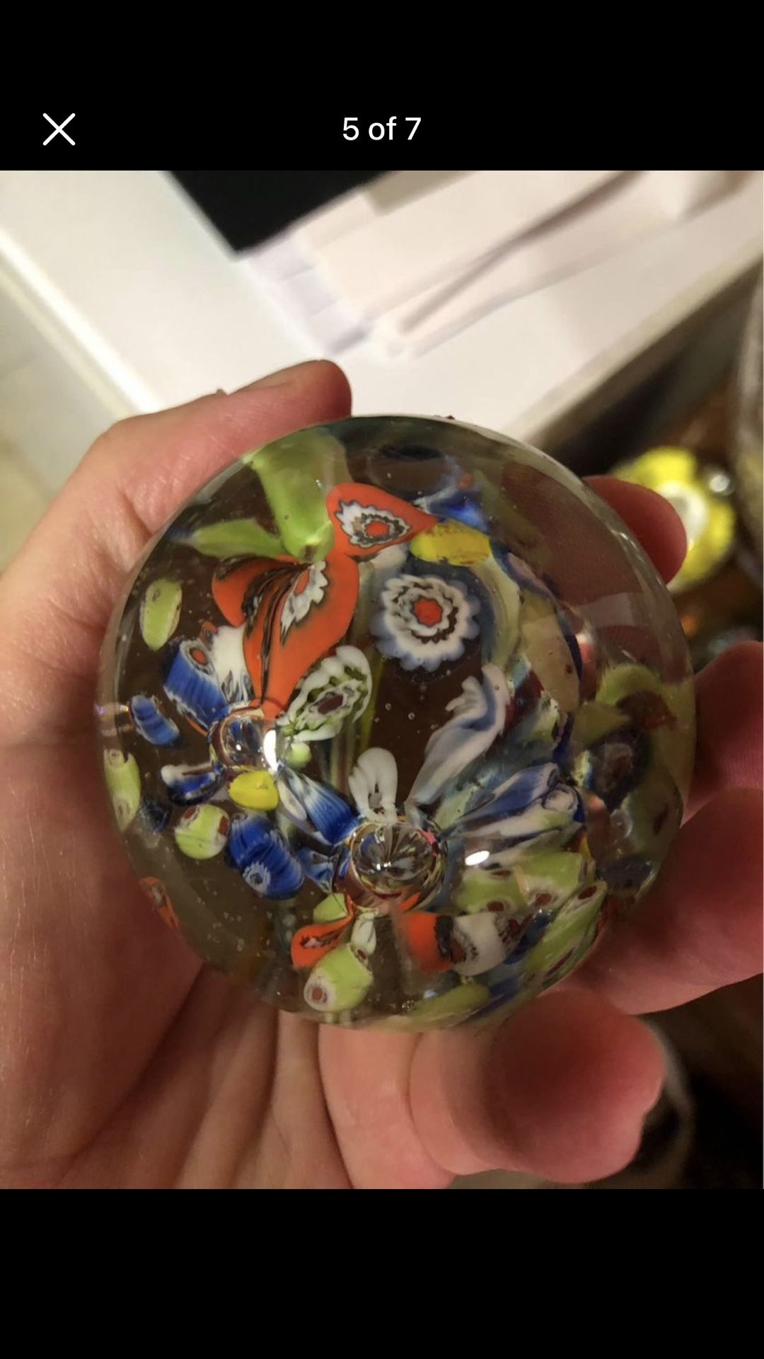 Vintage clear paperweight with colorful flowers inside
