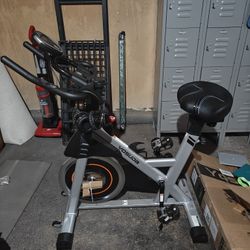 YOSUDA Exercise Bike w/ BLUE WIND Noseless Seat