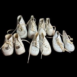 5 pair of shoes all different size 1- buster brown 1- stride rite no sure what size but I believe 3 months to 1 year range all white leather. T-77
