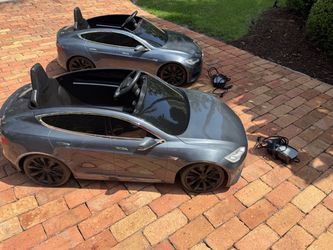 Radio Flyer Electric Tesla Model S for Kids ride in toy car in silver color