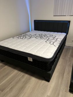 New Mattress.      Queen Size Mattress Pillow Top 12"    New Mattress In a plastic sealed.  We offer same day delivery