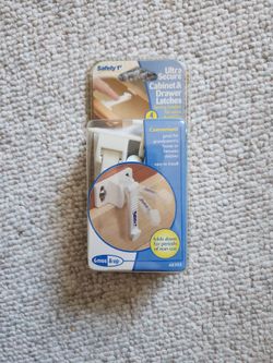 Cabinet and drawer security latch