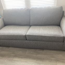 Comfy Grey Tweed Kevin Charles sofa.