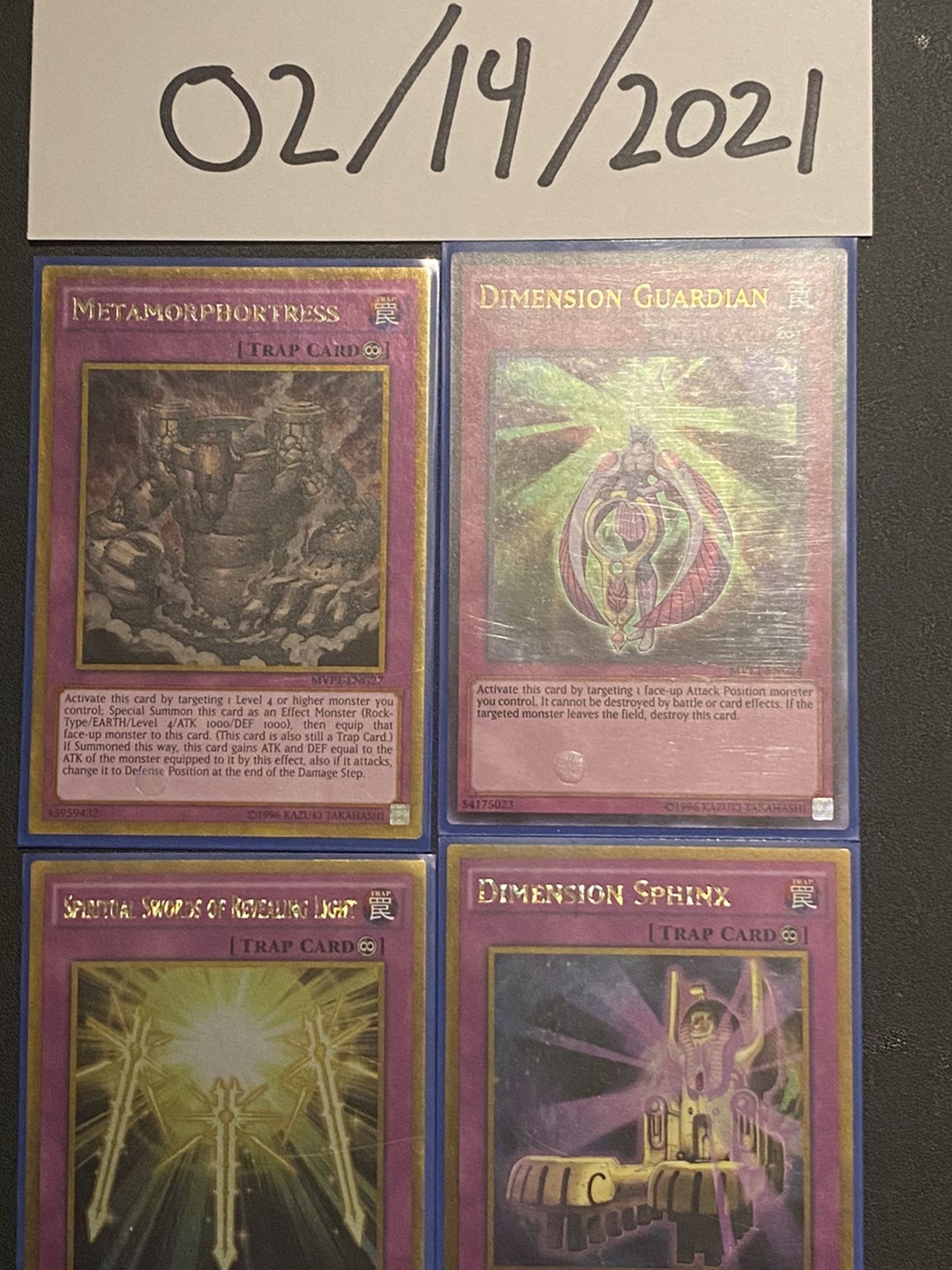 Yugioh Cards - Metamorphortress, Dimension Guardian, Spiritual Swords of Revealing Light, and Dimension Sphinx