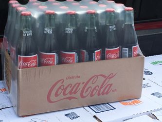 Coca Cola (medio litro)..