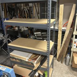 Garage shelving storage five shelves, metal and wood can be taken apart to fit into car