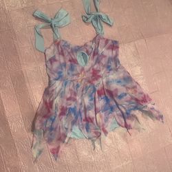 Playful pastel tie-dye mini dress. With mesh butterfly fabric Adjustable tie-shoulder straps. Small front keyhole detail. Handkerchief hem for movemen