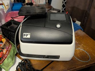Mail parcel scale and label maker