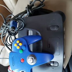 Nintendo 64 system with controller, 
power cord and av cord great condition and Working Perfectly. 