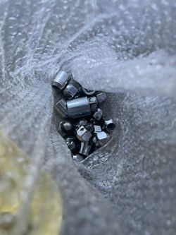 Bag Of OEM Subaru Lug Nuts And Lock Nuts