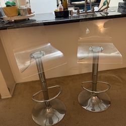 Two Hydraulic  Acrylic Clear barstools 