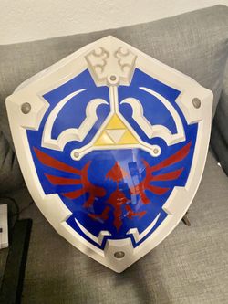 Zelda Hylian shield (think geek backpack)