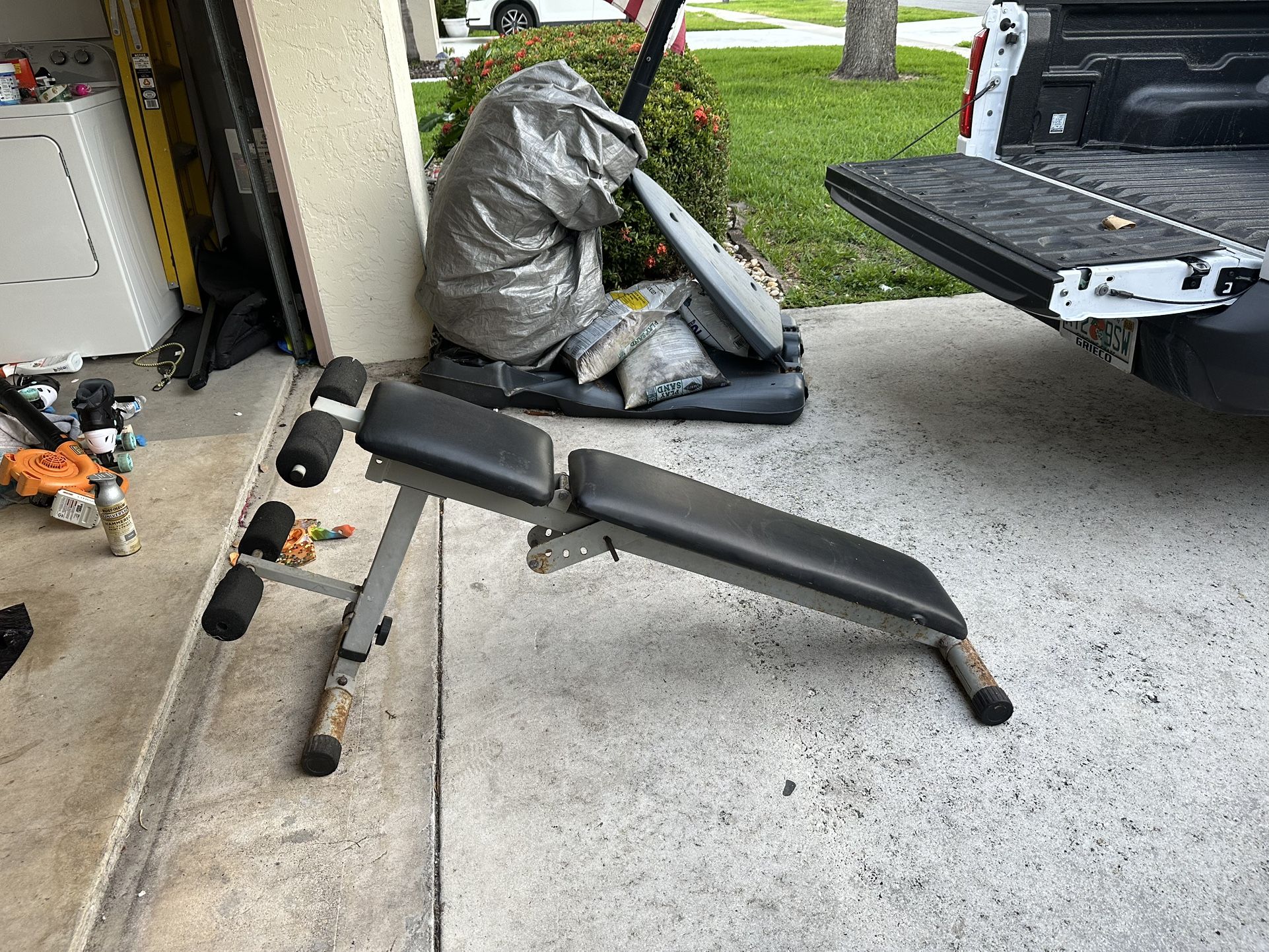 Adjustable bench can be used flat decline in incline grade for squats, bench press, and lifting Olympic weights or dumbbells