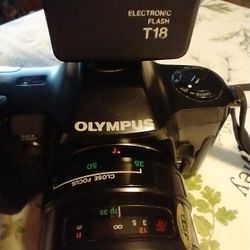 Olympus Film Camera With Flash And Case Used But In Good Condition Takes Four AAA Batteries For Camera And Two AA Batteries For Flash