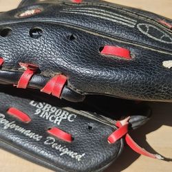 Rawlings youth baseball or softball glove, specifically a 9-inch model from their "Performance Designed" series