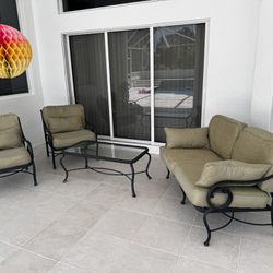 4 pieces Patio aluminum furniture set loveseat, coffee table, 2 seating chairs and 4 pillows  In great condition, removable cushions 